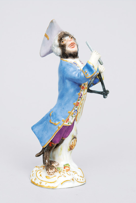 A figurine "triangle player" of serial "music playing monkeys"