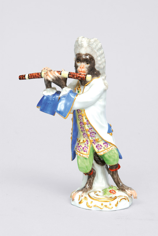A figurine "German flute player" of serial "music playing monkeys"