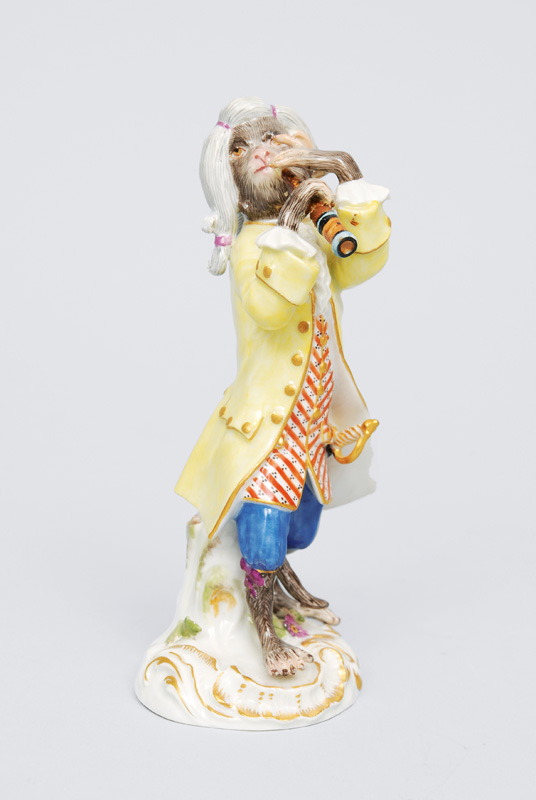 A figurine "clarinet player" of serial "music playing monkeys"