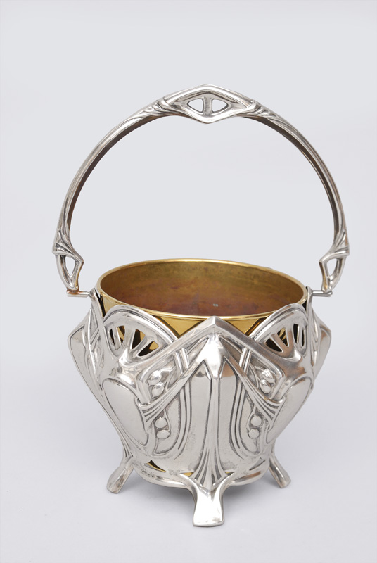 A small Art Nouveau bowl with handle