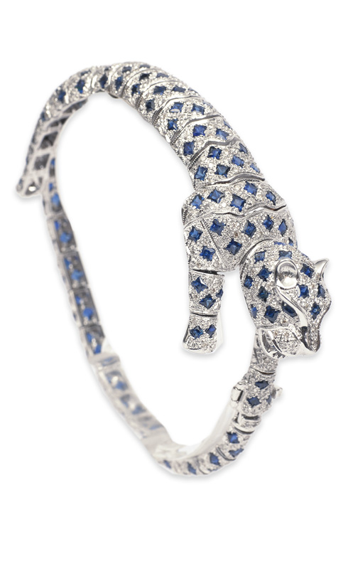 An interesting panther bracelet with sapphires and diamonds in style of Cartier