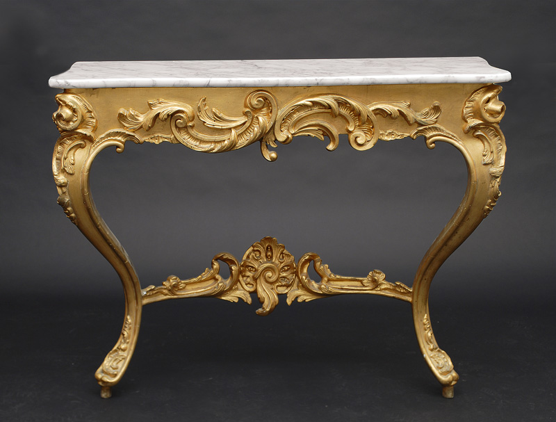 A richly decorated Louis-Philippe console table