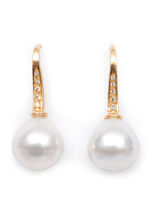 A pair of Southsea pearl earrrings with diamonds