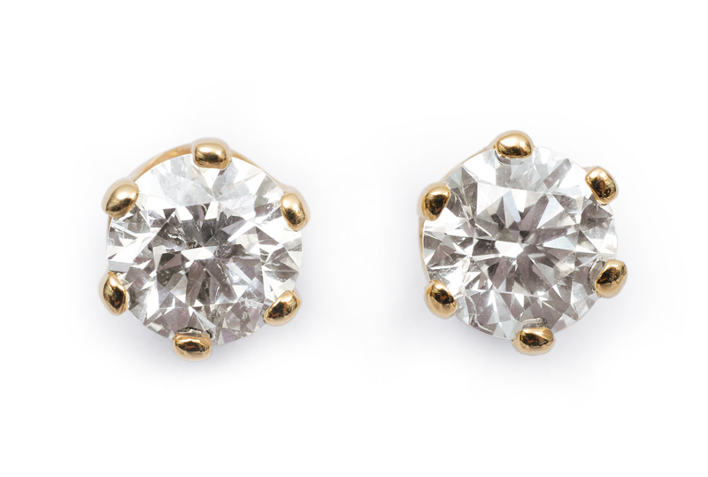 A pair of single stone diamond earstuds