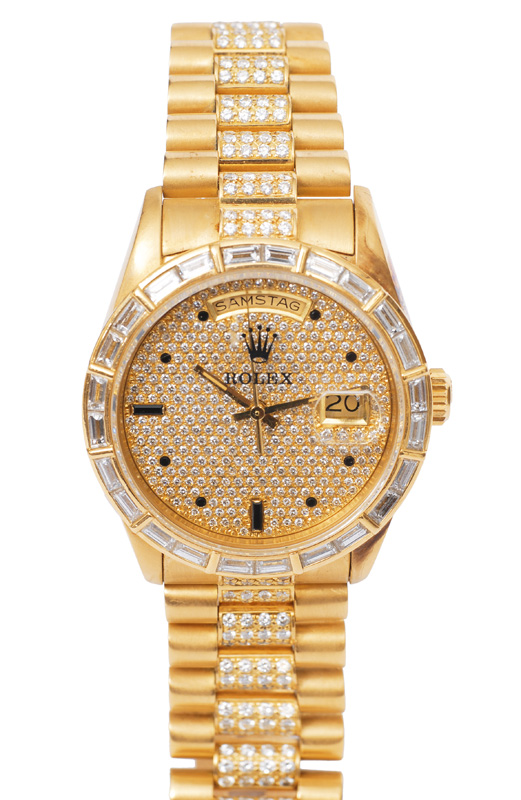 Extravagante, hochkarätige Herren-Armbanduhr von Rolex mit reichem Brillant-Besa