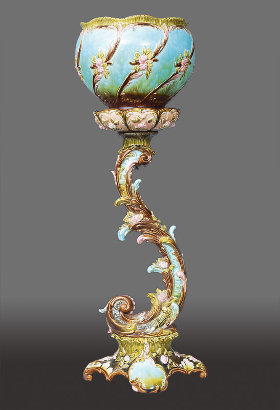 An Art Nouveau flower stand with opulent floral decor