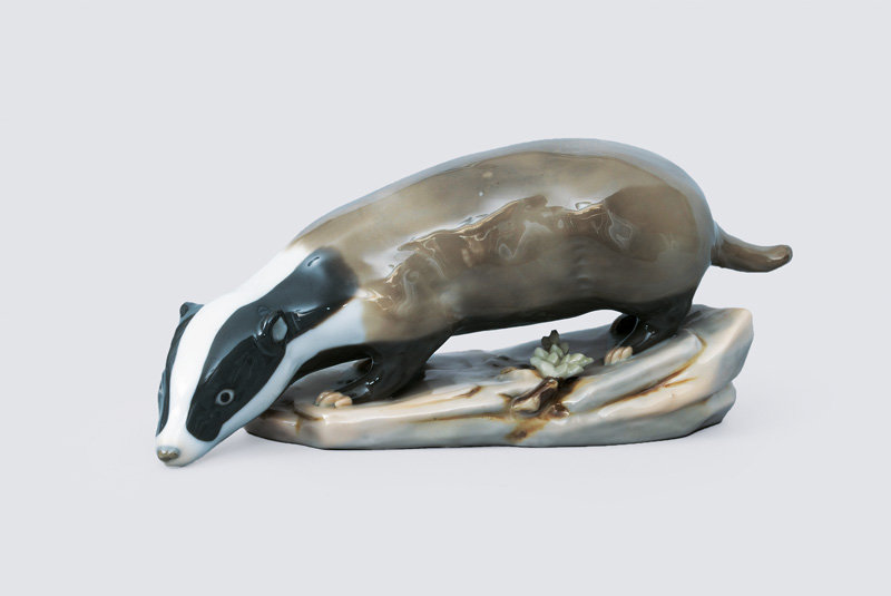 A rare animal figurine "Badger on rock base"