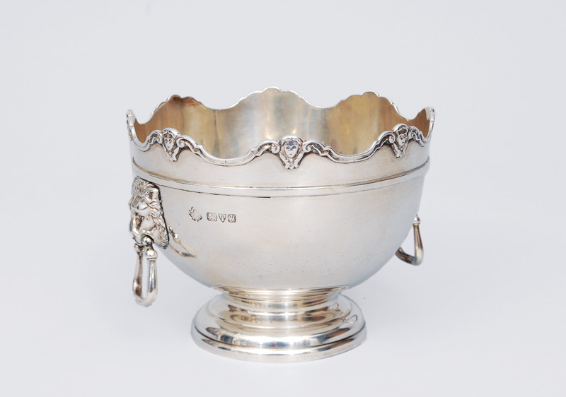 An english sugar bowl with lion head shaped handle