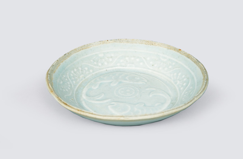 A small bowl with qingbei glaze and twin fish relief