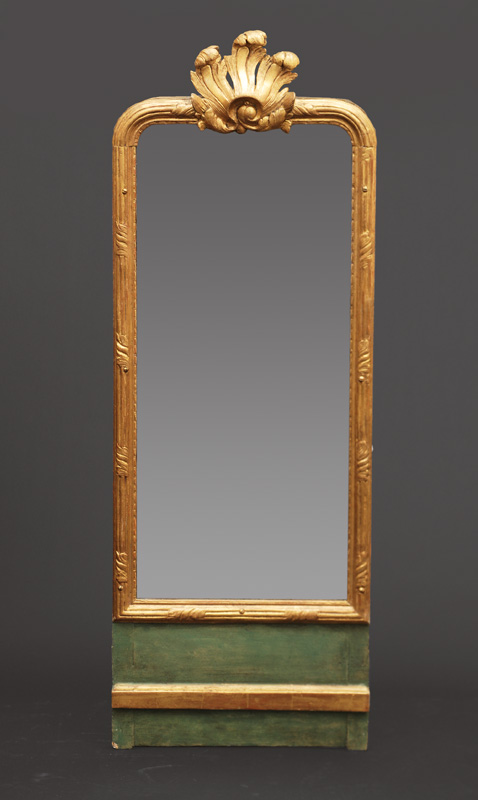 A Louis-Seize mirror with foliage ornaments