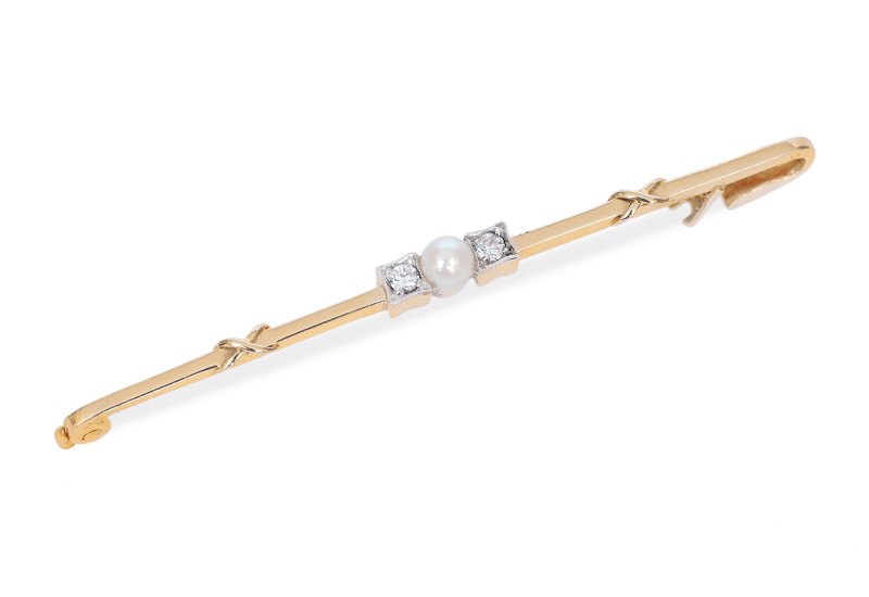 A needle brooch with pearl and old cut diamonds