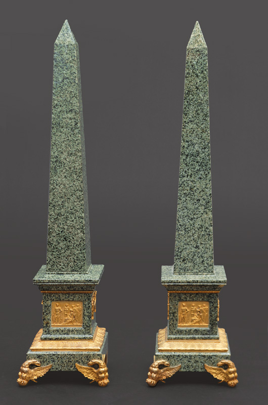 A pair of obeliskes with empire decor