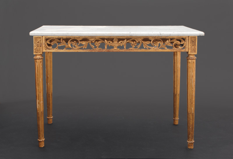 A rare Louis-Seize console table with fine floral decor