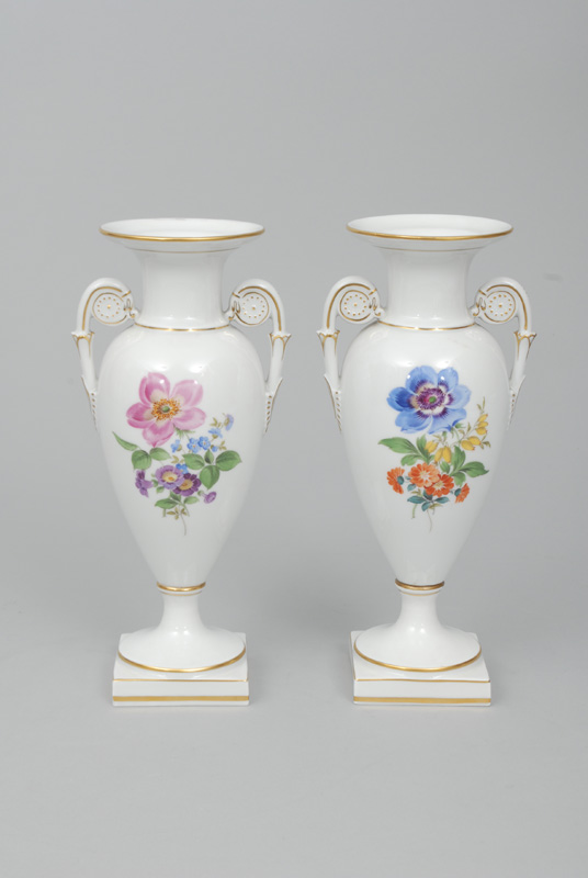 A pair of amphorae-shaped vases with flower painting and gilding