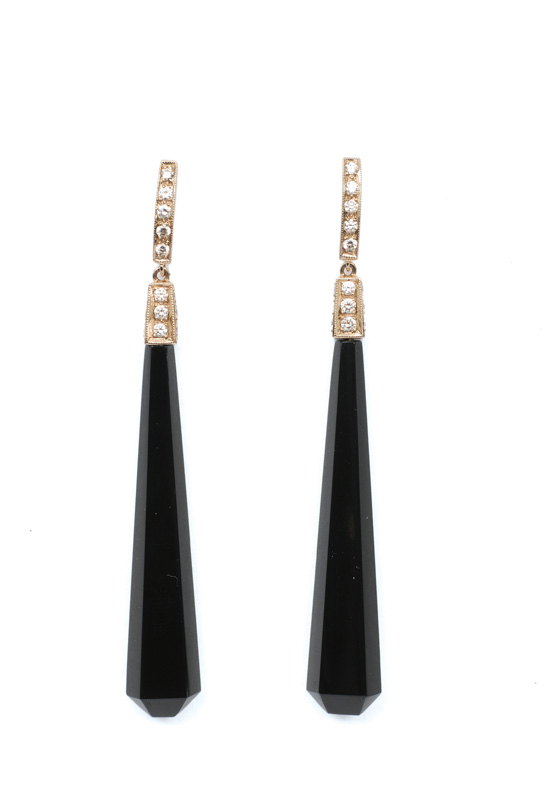 A pair of onyx diamond earpendants in the style of Art-déco