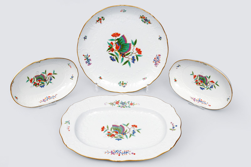 A convolute of 4 different platters with Marseille relief and butterfly pattern