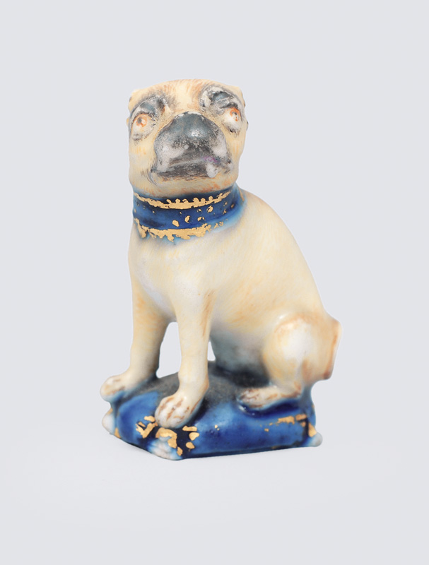 An animal miniature "Sitting pug"