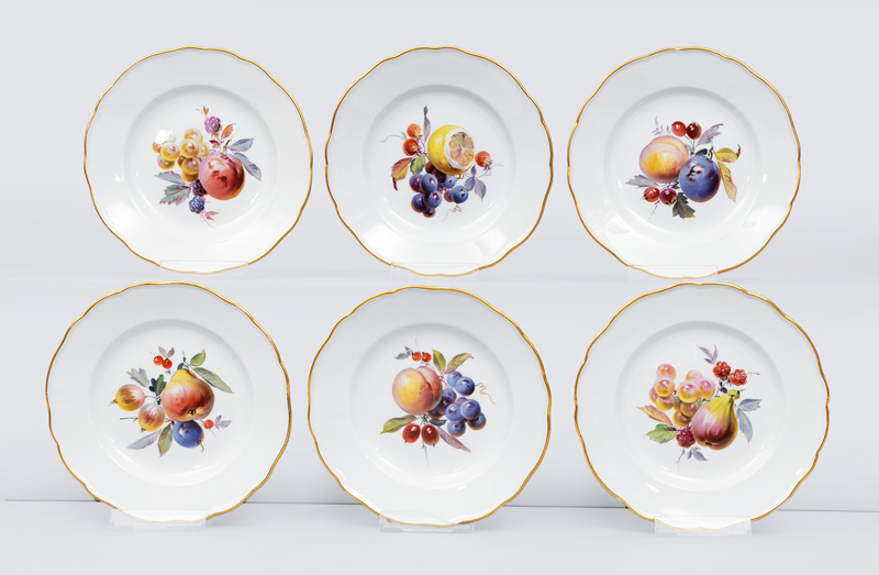 A set of 6 small plates with fruit painting and gilded rim