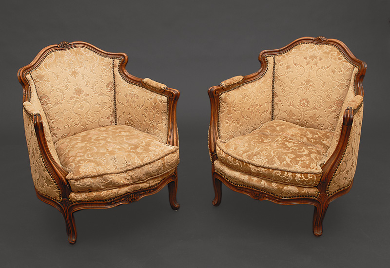 A pair of small armchairs