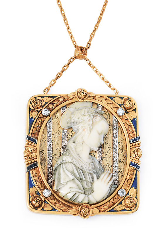 An Art-Nouveau pendant with ivory engraving of the "Madonna" afte Filippo Lippi