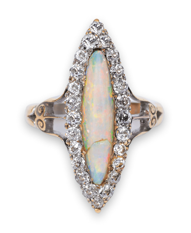 A Victorian opal ring with old cut diamonds