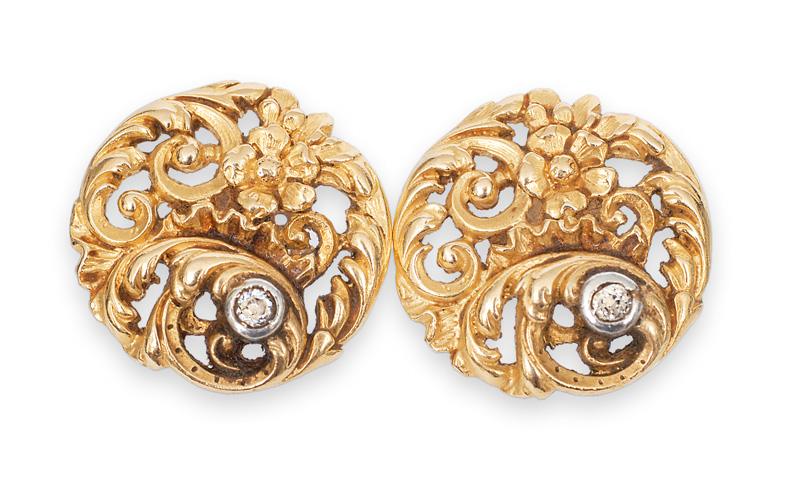A pair of Art-Nouveau gold earstuds with diamonds