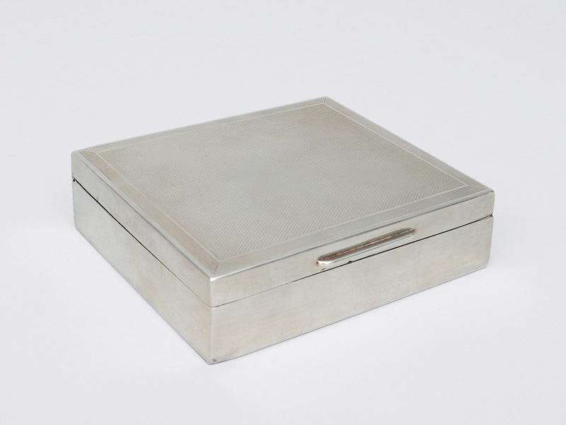 A cigarette case with fine wave-shaped decor