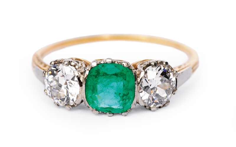 An Art-Nouveau emerald diamond ring