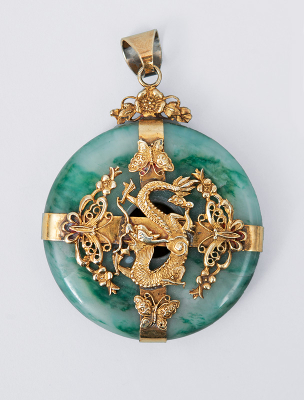 A big jade pendant with dragon mounting