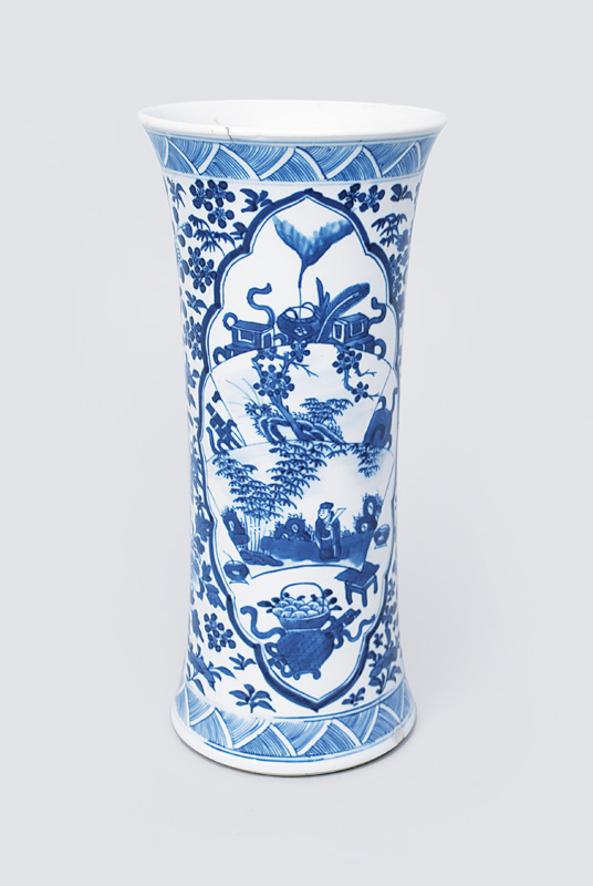 A vase with blue decoration