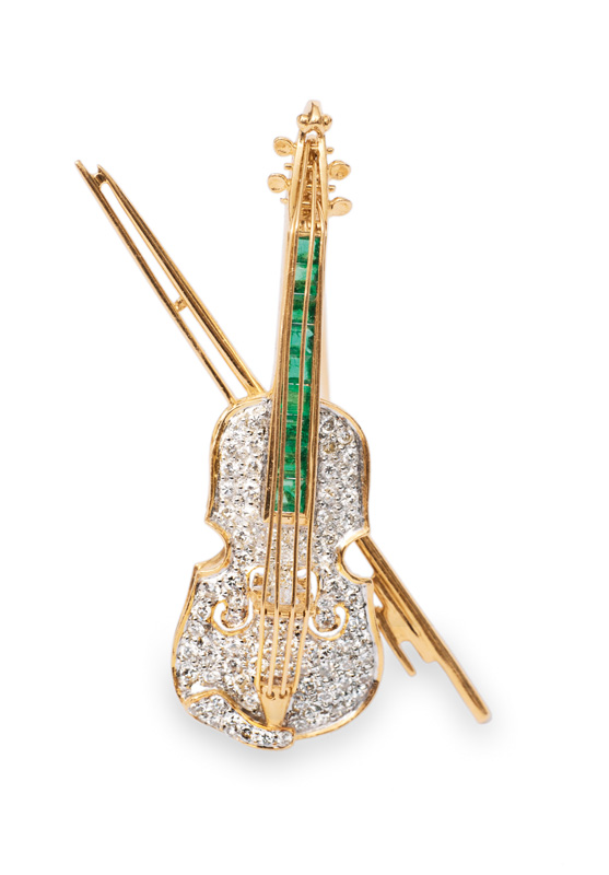 Feine Brilant-Smaragd-Brosche "Geige" von Gübelin
