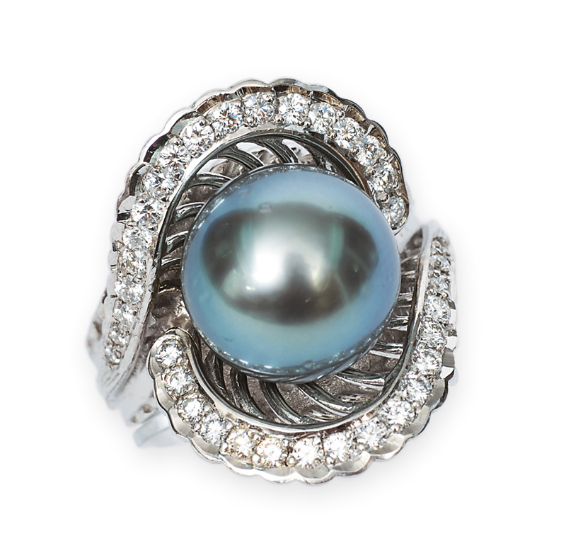 A large Tahiti pearl ring with diamonds