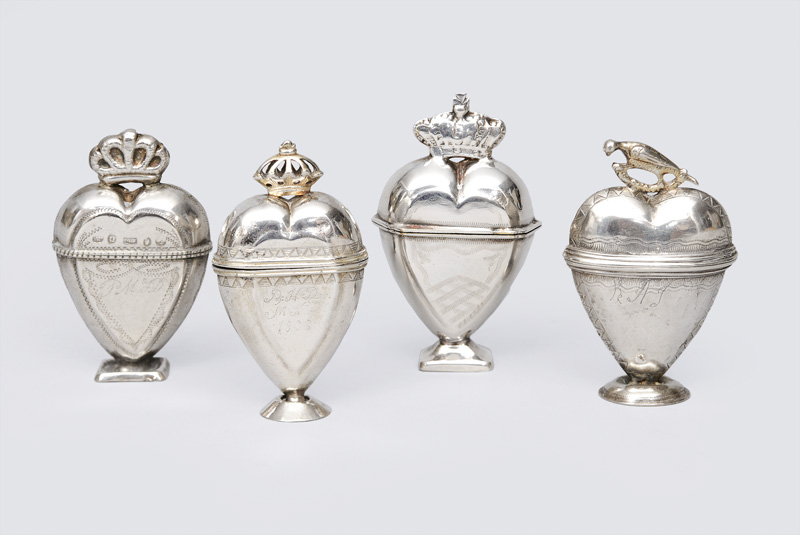 A set of 4 fragrance jars in shape of hearts