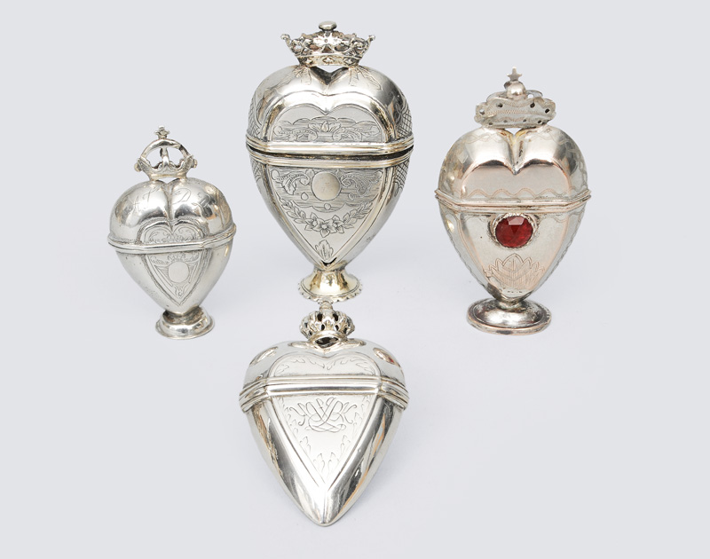 A set of 4 fragrances jars in heartshape