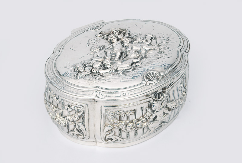 An pompous case with putti relief