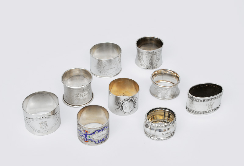 A set of 9 napkin rings