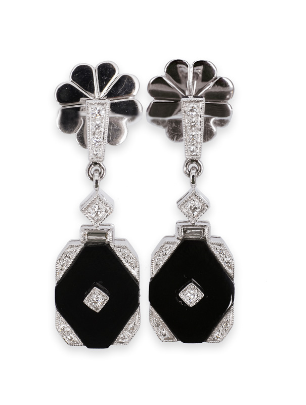 A pair of onyx diamond earpendants in the style of Art-déco