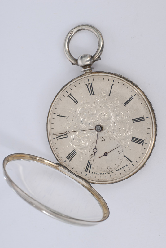A small open-face pocket watch