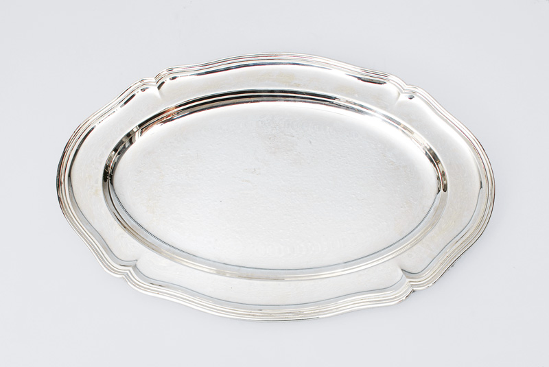 An oval, plated dish in Chippendale style