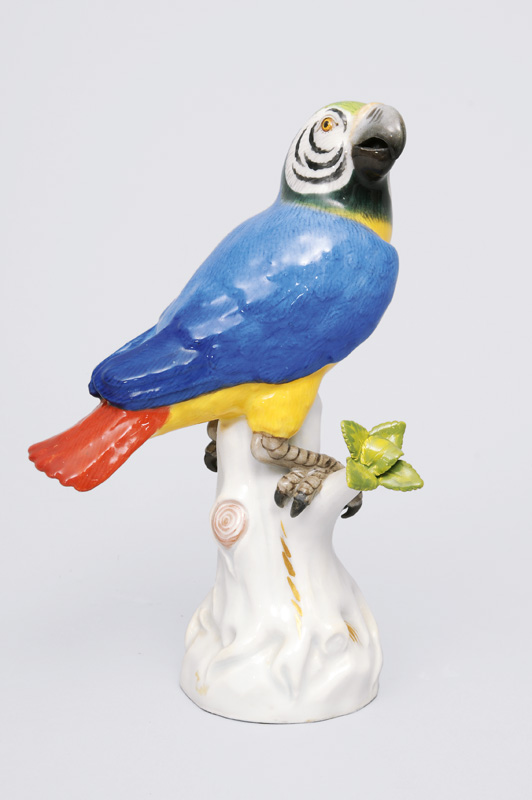 A small figurine "Parrot on branch base"