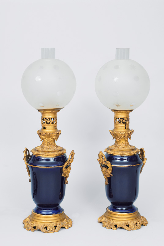 A pair of cobalt blue petrol lamps