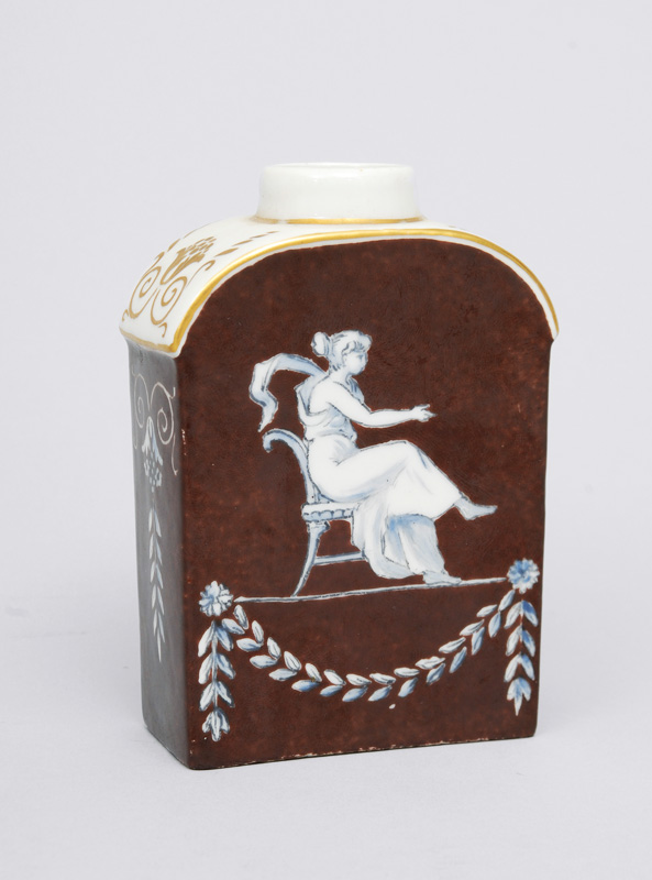 A brown grounded Empire tea caddy with gray painting
