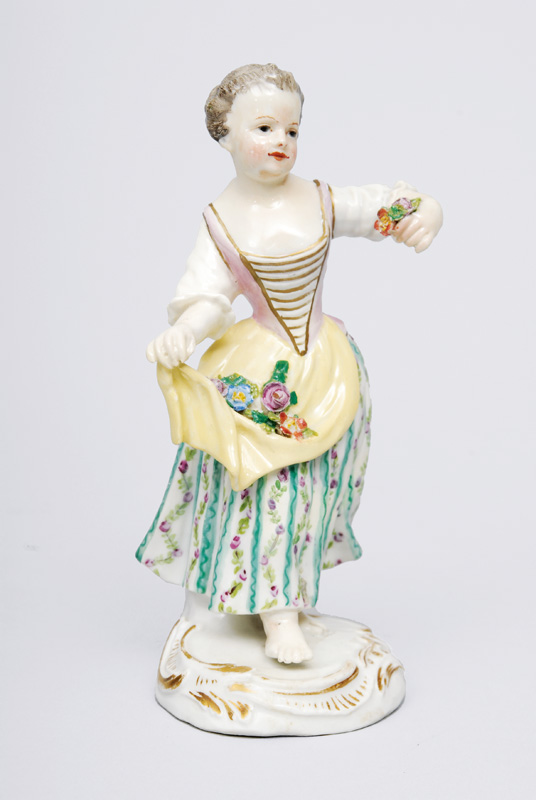 Figur "Gärtnerkind mit Blumenschürze"