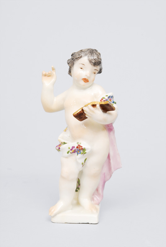 A figurine "Putto as allegory of music"