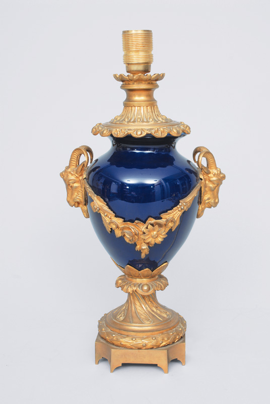 A cobalt blue vaselamp with bronze mounting
