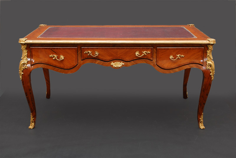 A large Bureau Plat in the style of Louis Quinze