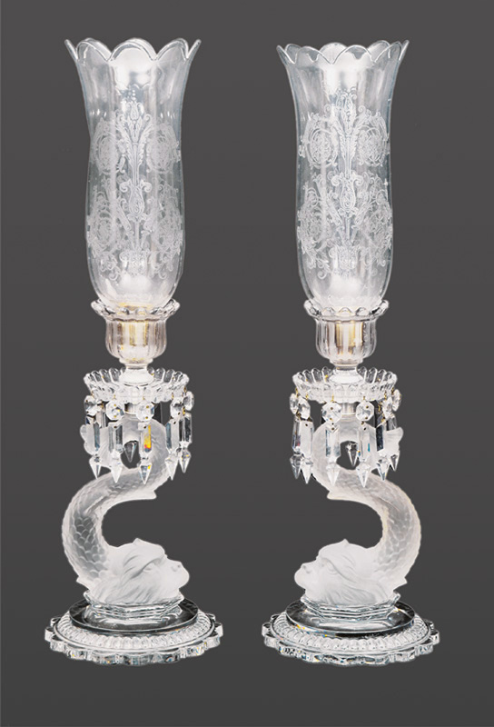 A pair of big Baccarat candel sticks with dolphin