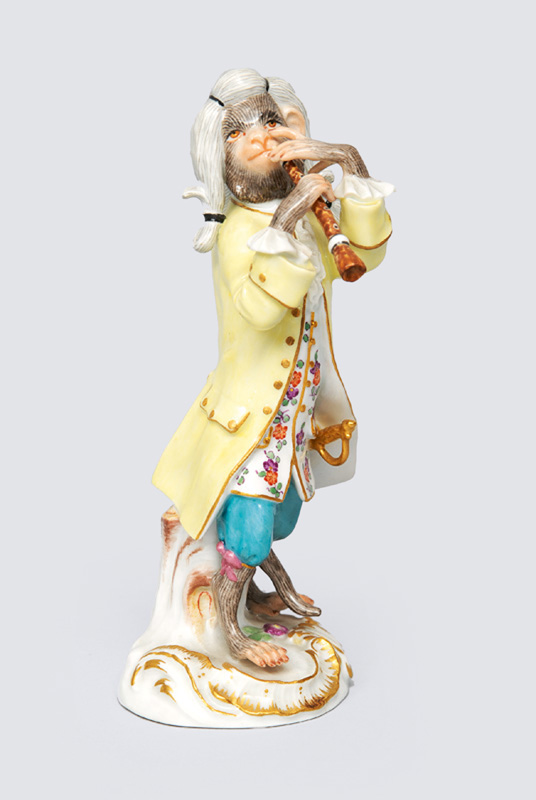 A figurine "clarinet player" of serial "music playing monkeys"