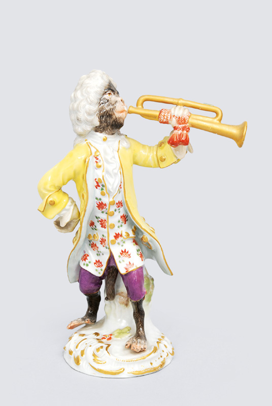 A figurine "trumpet eplayer" of serial "music playing monkeys"