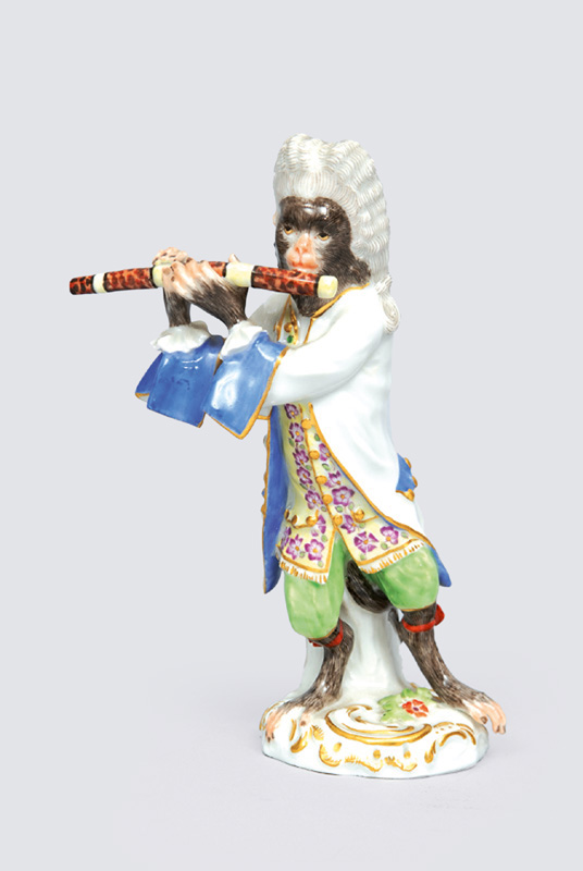 A figurine "German flute player" of serial "music playing monkeys"